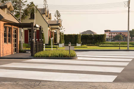 Zebra crosswalk on the road for safety when people walking cross the road.の写真素材