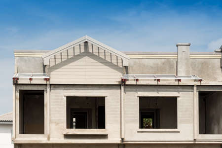 Prefabricated building isolated on blue sky background.の写真素材