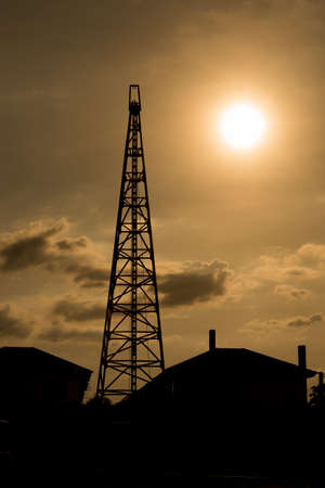 Silhouette of construction site before the sunset.
