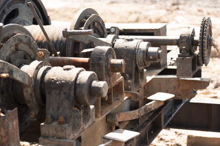 Gear wheel of heavy machinery dirty and rusty.の写真素材