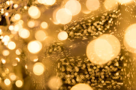 Christmas bokeh lights refocused blurred background, Abstract texture.