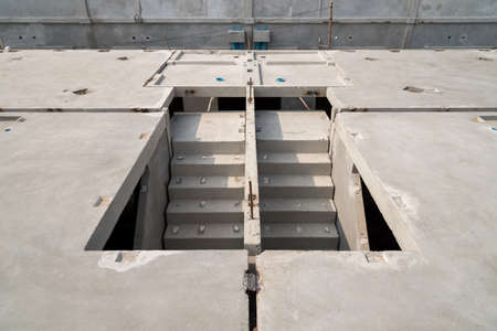 Prefabricated concrete floor slab panel have an staircase on construction site.