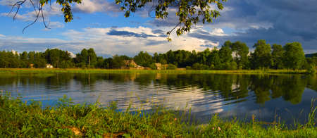 Lake in Russia (Londoko village) Lake, grass and water.