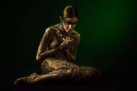 Brunette woman with body artの写真素材