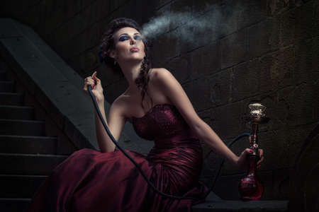 Beautiful woman in violet dress