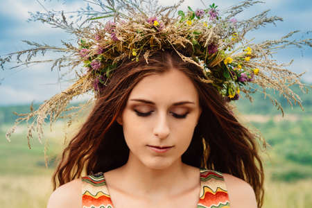 Woman walking in fieldの写真素材