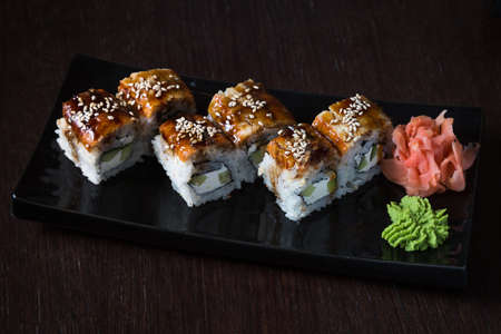 Rolls on a black plate