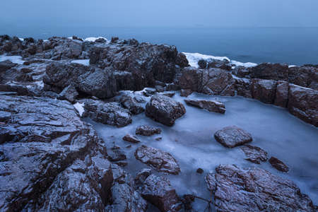 Long exposure shot of a winter seaの写真素材