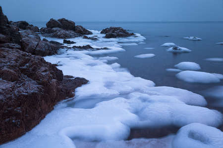 Long exposure shot of a winter seaの写真素材