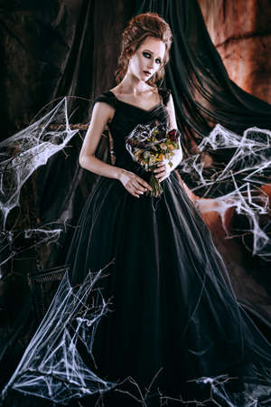 Dark woman in blackの写真素材