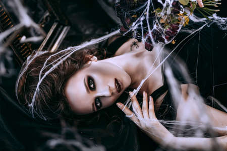 Dark woman in blackの写真素材