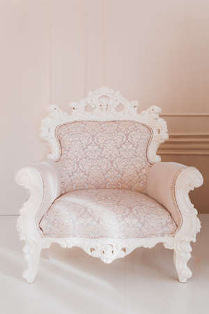 Armchair on wall backgroundの写真素材