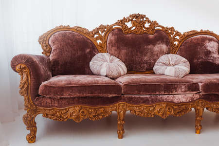 Brown sofa in white interior