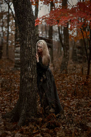 Witch in a long black dress
