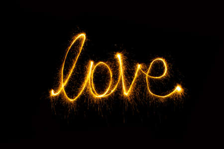 Abstract sparkler firework light on black backgroundの写真素材