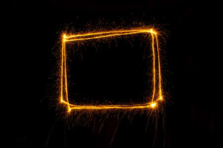 Abstract sparkler firework light on black background