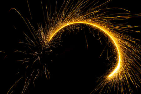 Abstract sparkler firework light on black background