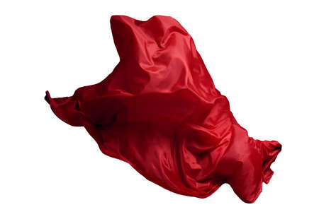 Abstract red flying fabric isolated on white backgroundの写真素材