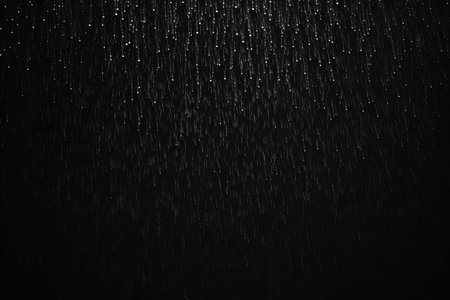 Rain texture overlay effect on black background, realistic rainfallの素材