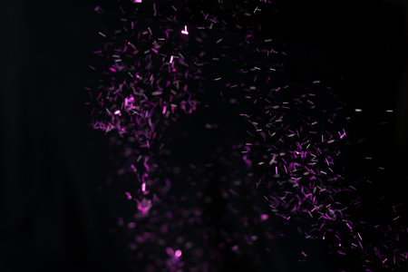 Party Colorful Glitter Confetti on Black Backgroundの写真素材