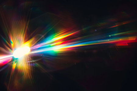 Abstract blurred colorful lens flare bokeh on blackの素材