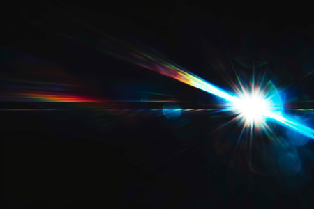 Abstract blurred colorful lens flare bokeh on blackの素材
