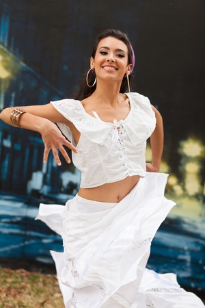 Beautiful young woman outdoors flamenco dancingの写真素材