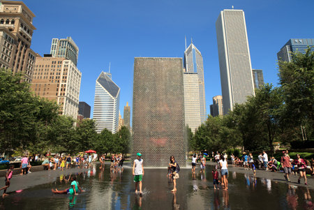 Visitors enjoying the Crown Fountain in Millennium Park in downtown Chicago.のeditorial素材