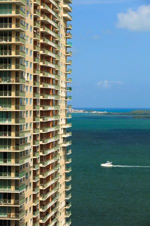 Portrait view of Biscayne Bay and tall condominium in the Brickell Avenue area of downtowm Miami のeditorial素材