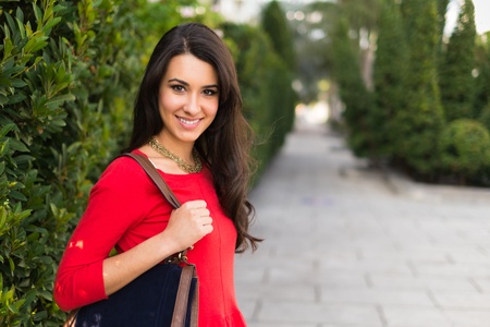 Beautiful young multicultural woman outdoor portrait の写真素材