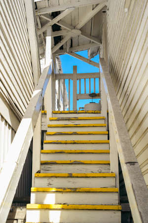 Wooden staircase in the exterior of a building.の写真素材