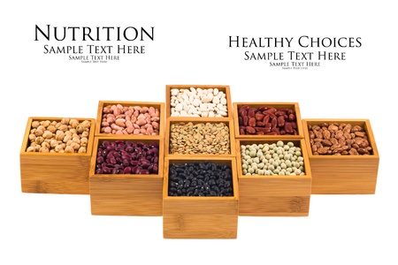 Collection of various beans contained in wood boxes on a white background の写真素材