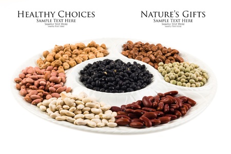 Collection of various beans on a round white plate isolated on a white background 