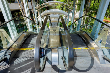 Escalator in a outdoor shopping mall.