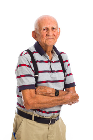 Elderly eighty plus year old man in a studio portrait on a white background.の写真素材