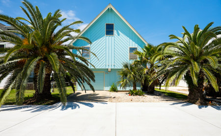 TIKI ISLAND, TEXAS USA - MAY 6, 2014: The village of Tiki Island, located on a small peninsula in Jones Bay in Galveston County, is a popular coastal community containing beautiful multi level waterfront homes.のeditorial素材