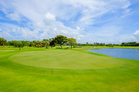 Golf course landscape viewed from behind the putting green.の写真素材