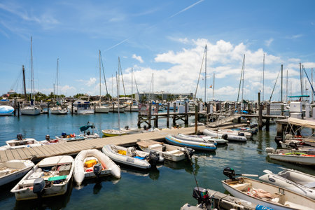 KEY WEST, FLORIDA USA - JUNE 26, 2014: Skiffs and dingys lined up along the Bight Marina in Key...