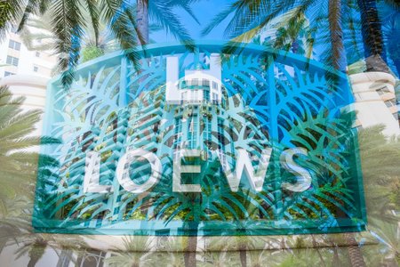 Miami Beach, Florida USA - August 1, 2014: A double exposure of the beautiful Loews Hotel in Miami Beach, a popular international travel destination, with palm trees and art deco architecture.のeditorial素材