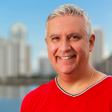 Handsome middle age man outdoor portrait with a downtown background.の写真素材