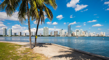 Beautiful Miami skyline along Biscayne Bay with tall Brickell Avenue condos and downtown office buildings.の写真素材