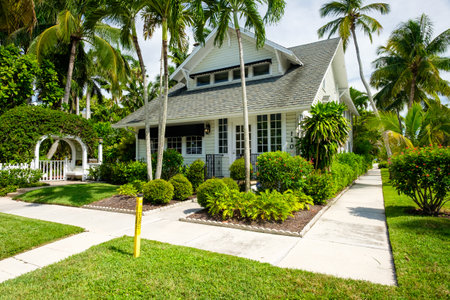 Naples, Florida USA - July 28, 2015: Typical vintage wood frame architecture style home in the coastal residential historic district of Naples.のeditorial素材