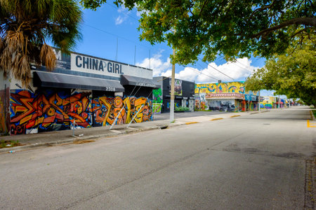 Miami, Florida USA - October 4, 2015: The  urban Wynwood area in midtown has become a popular tourist destination to view the colorful graffiti art murals that cover the facades of commercial warehouse style buildings.のeditorial素材