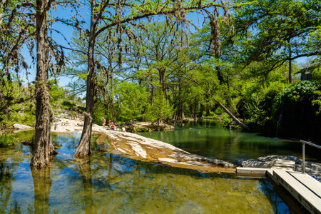 Spicewood, Texas USA - April 5, 2016: Krause Springs is a popular tourist destination with camping and swimming activities in the Texas Hill Country.のeditorial素材