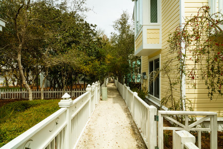 Seaside, FL USA - March 29, 2016: Alley between beautiful vacation homes in the North Florida panhandle coastal community.のeditorial素材