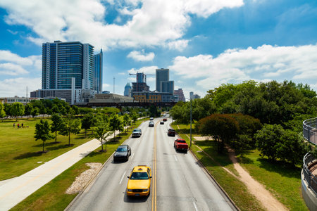 Austin, Texas USA - April 14, 2016: Busy Cesar Chavez Street viewed from the Lamar Pedestrian Bridge in the downtown area.のeditorial素材