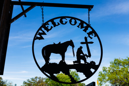 Llano, Texas USA - April 5, 2016: Vintage welcome business sign in the small Texas Hill Country town of LLano.のeditorial素材