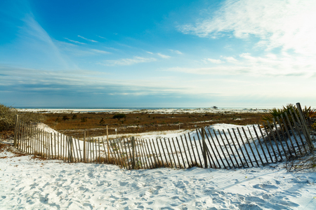 Beautiful white powder sand beach in the Florida panhandle in the late afternoon.の写真素材