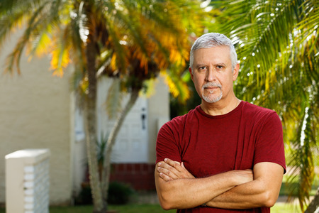 Handsome middle age man outdoor portrait.