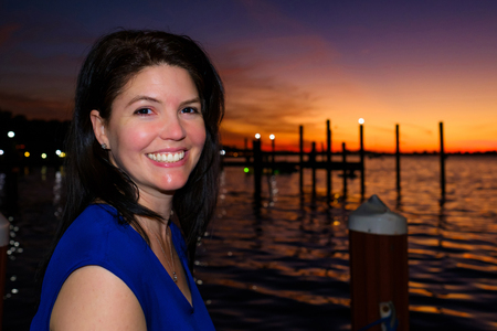 Pretty middle age woman enjoying the sunset in the Florida Keys.の写真素材